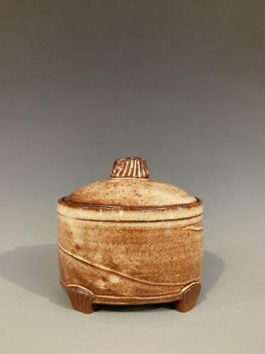 Brown thrown and altered jar by Karen Fevold